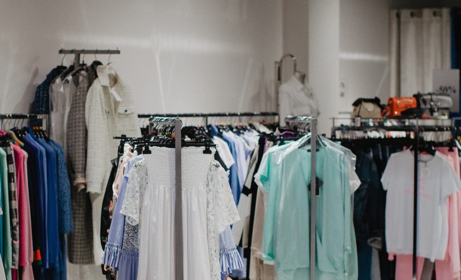 Clothes on hangers in the store